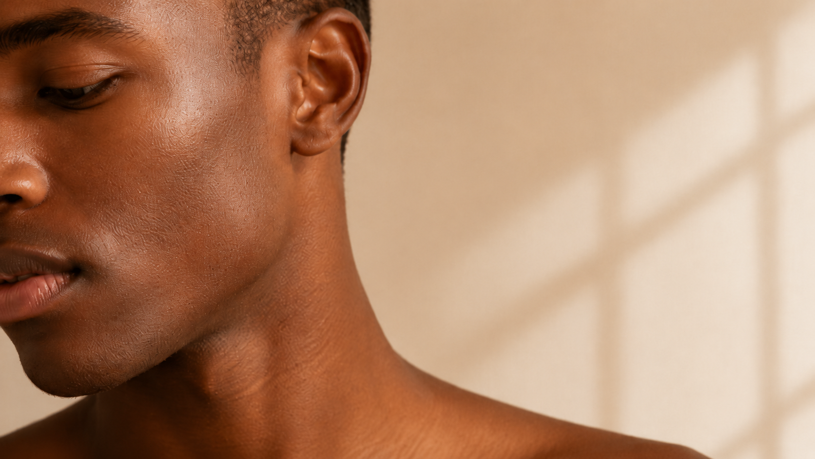 A person in warm window light
